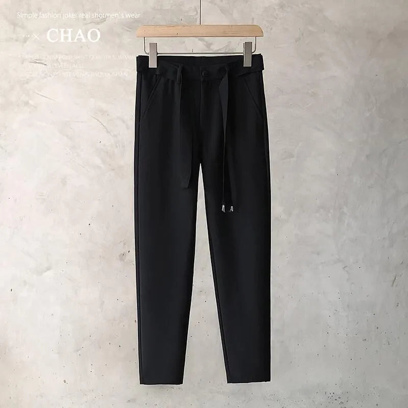 Boys slim straight wool trousers in a tapered cut with a straight leg opening.