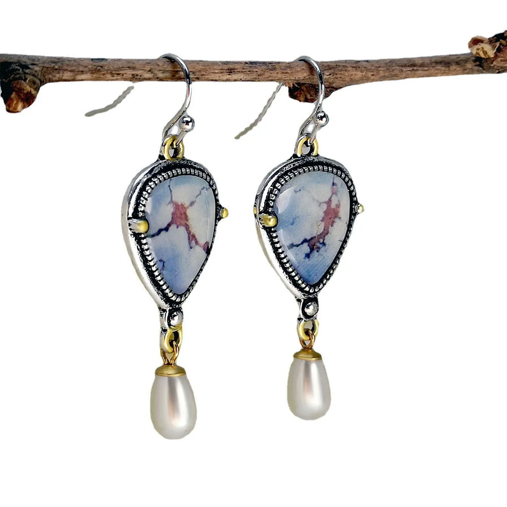 Retro blue geometric drop earrings with synthetic opal and pearl on metal.