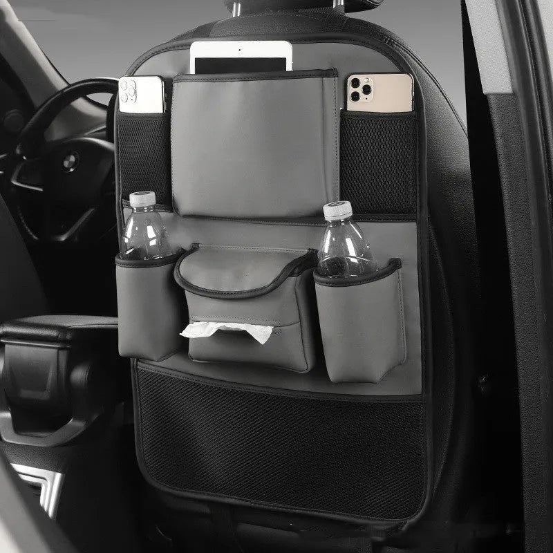 Leather car seat back storage bag mounted behind a car seat in a choice of black, brown, green, or grey.