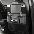 Leather car seat back storage bag mounted behind a car seat in a choice of black, brown, green, or grey.