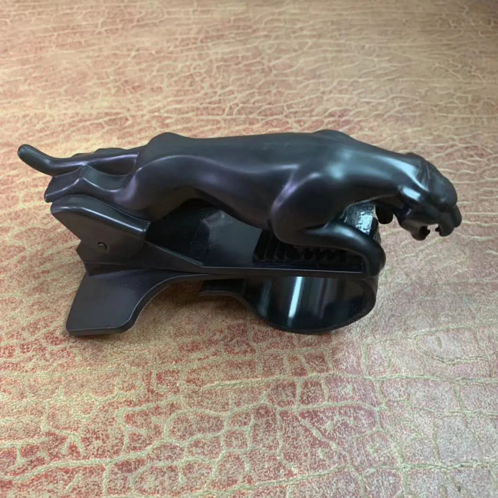 Black car mobile phone holder with a 360-degree rotatable bracket mounted on a car windscreen.