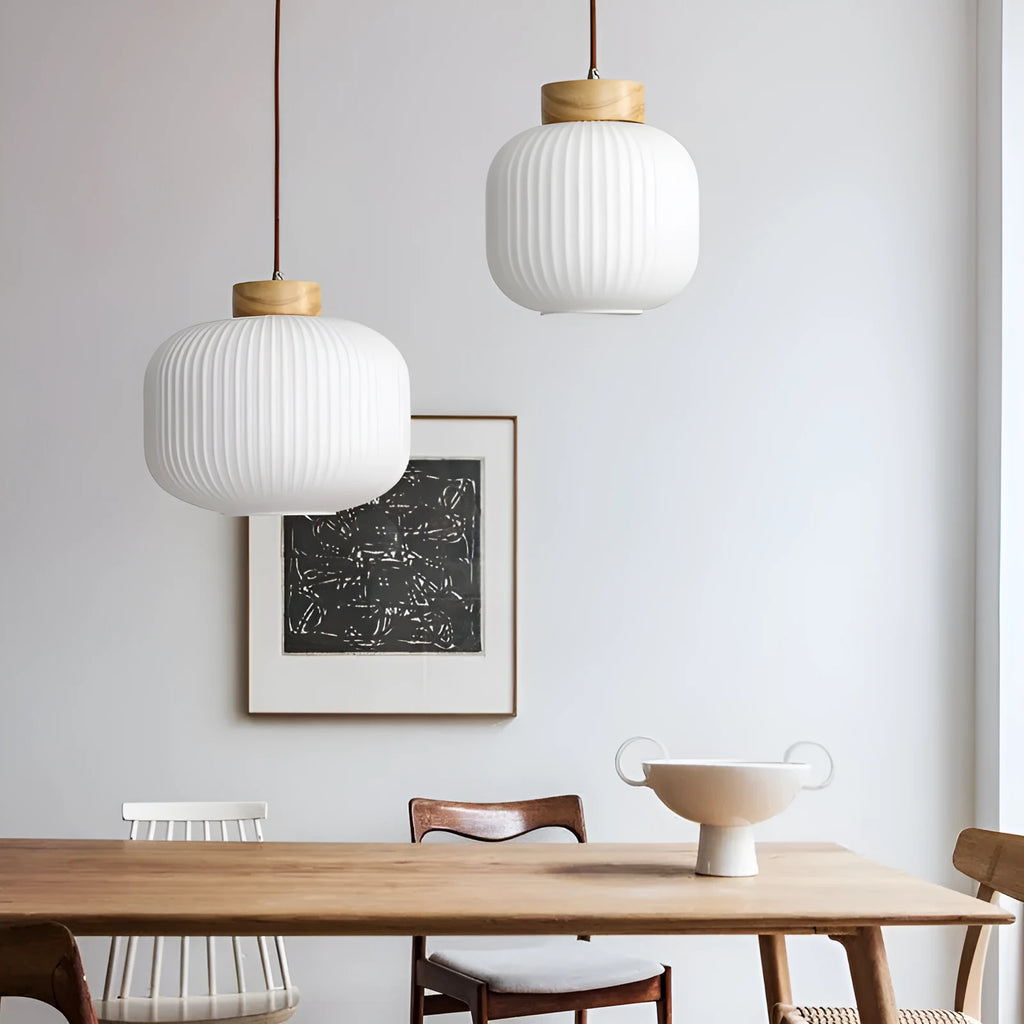 Retro Nordic style wooden pendant ceiling light with a choice of three sizes and three light colours.