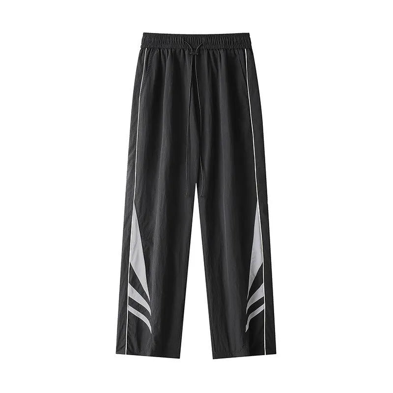 Men's straight leg casual trousers in grey, featuring an elasticated waistband and a loose fit.