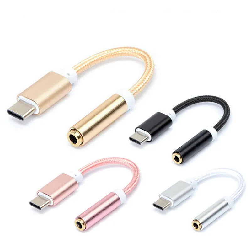 Woven nylon Type-C to 3.5mm female headphone adapter cable in black, silver, gold, and rose gold.