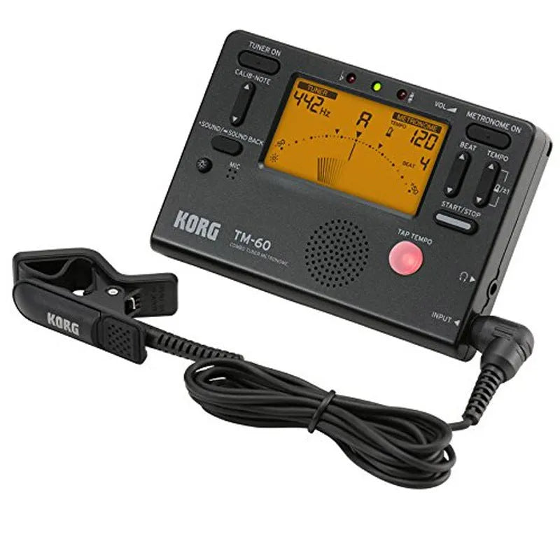 Black and silver digital metronome tuner with plastic shell and TAP TEMPO button for piano and guitar practice