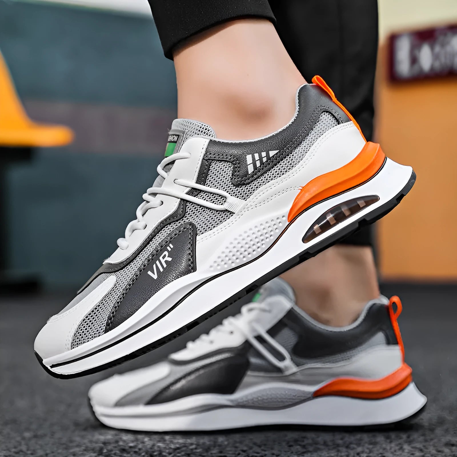 Men's gray and black breathable mesh casual running shoes with a round toe and EVA sole.
