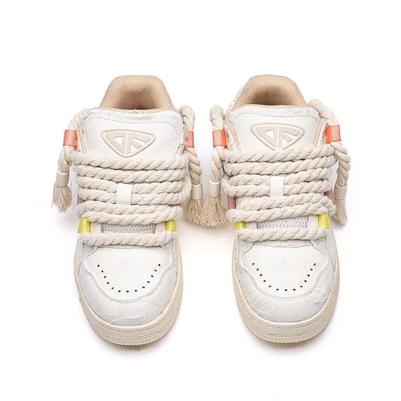 Creamy white retro low-top skate shoes with platform heel and round toe