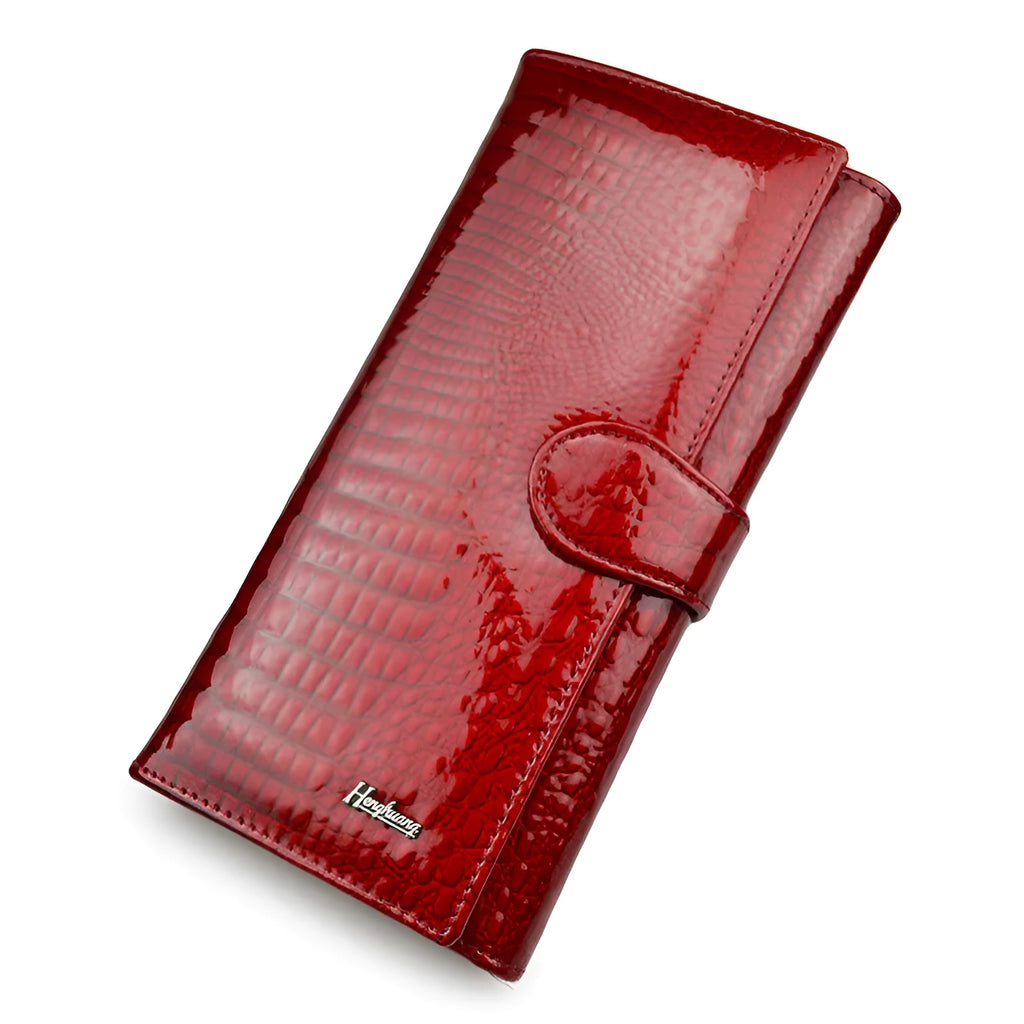 Women's leather coin purse with patent finish and crocodile pattern in red, wine red, and black colour options