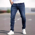 Men's dark blue slim fit cotton jeans with skinny leg opening and mid waist