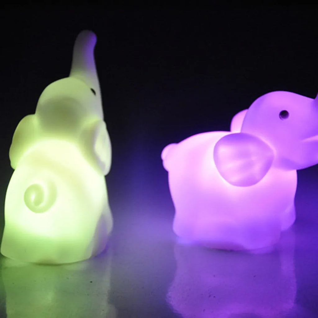 Elephant night light, vinyl, 8x8.8x4.5cm, with 7 colour changing slow flashing battery-powered light