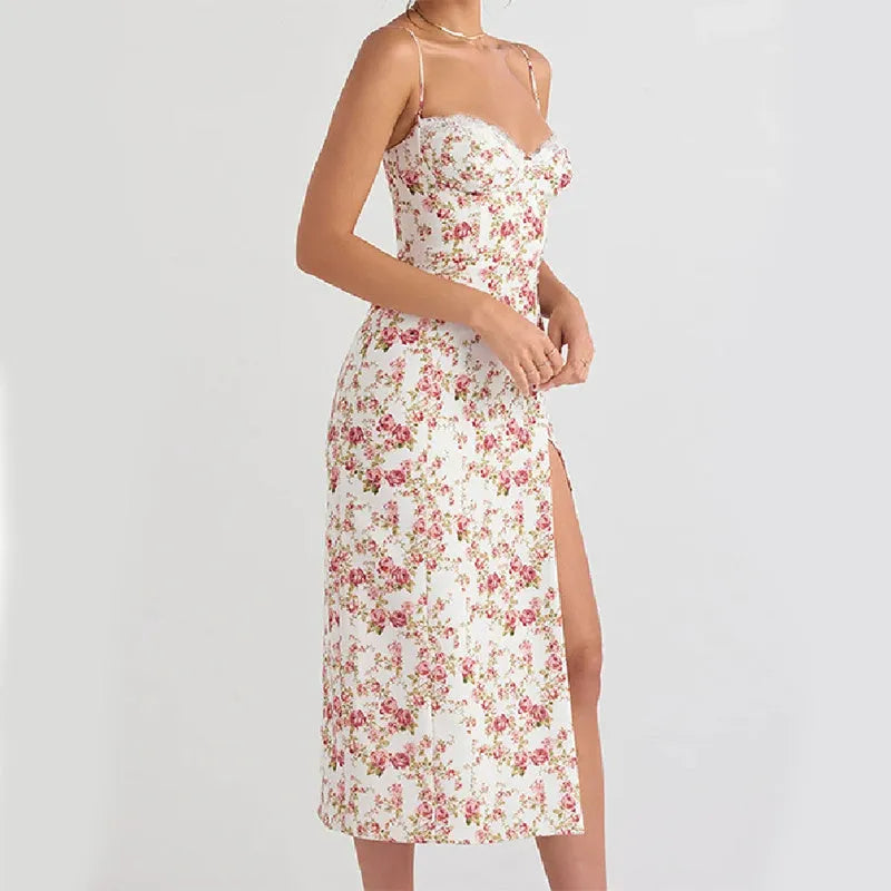 Women's blue lace print long dress with suspender straps and a thigh-high side slit.