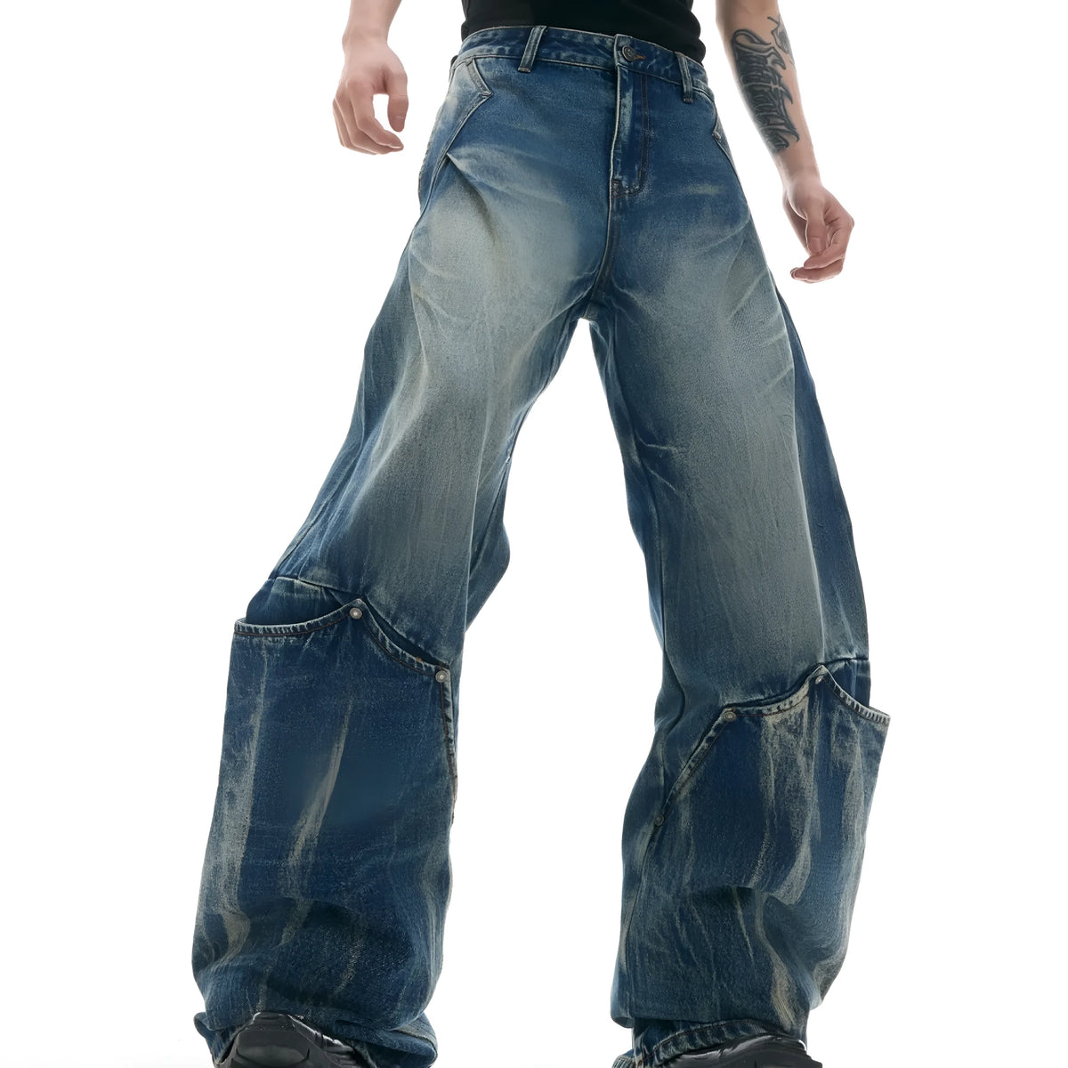 Men's Verdant Blue loose fit jeans with retro washed burst pattern and curved knife design