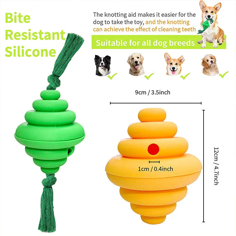 Green and yellow silicone dog ball with attached rope for tug-of-war and treat dispensing