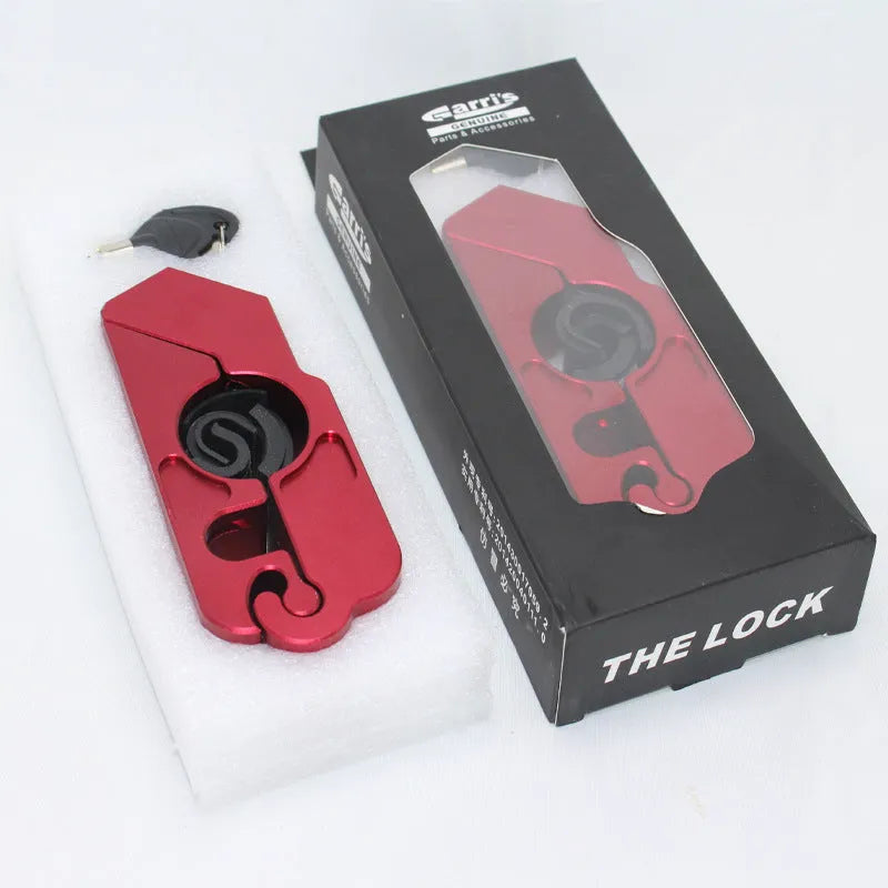 Motorcycle handlebar lock in CNC aluminium alloy, 14.7 cm long, shown in black with two wrenches