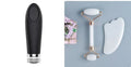 Natural white jade facial roller and gua sha scraping board set on a white background.