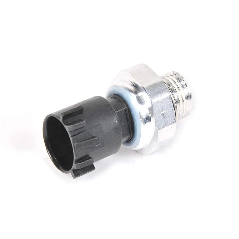 Silver automobile fuel pressure sensor with single port on a white background.