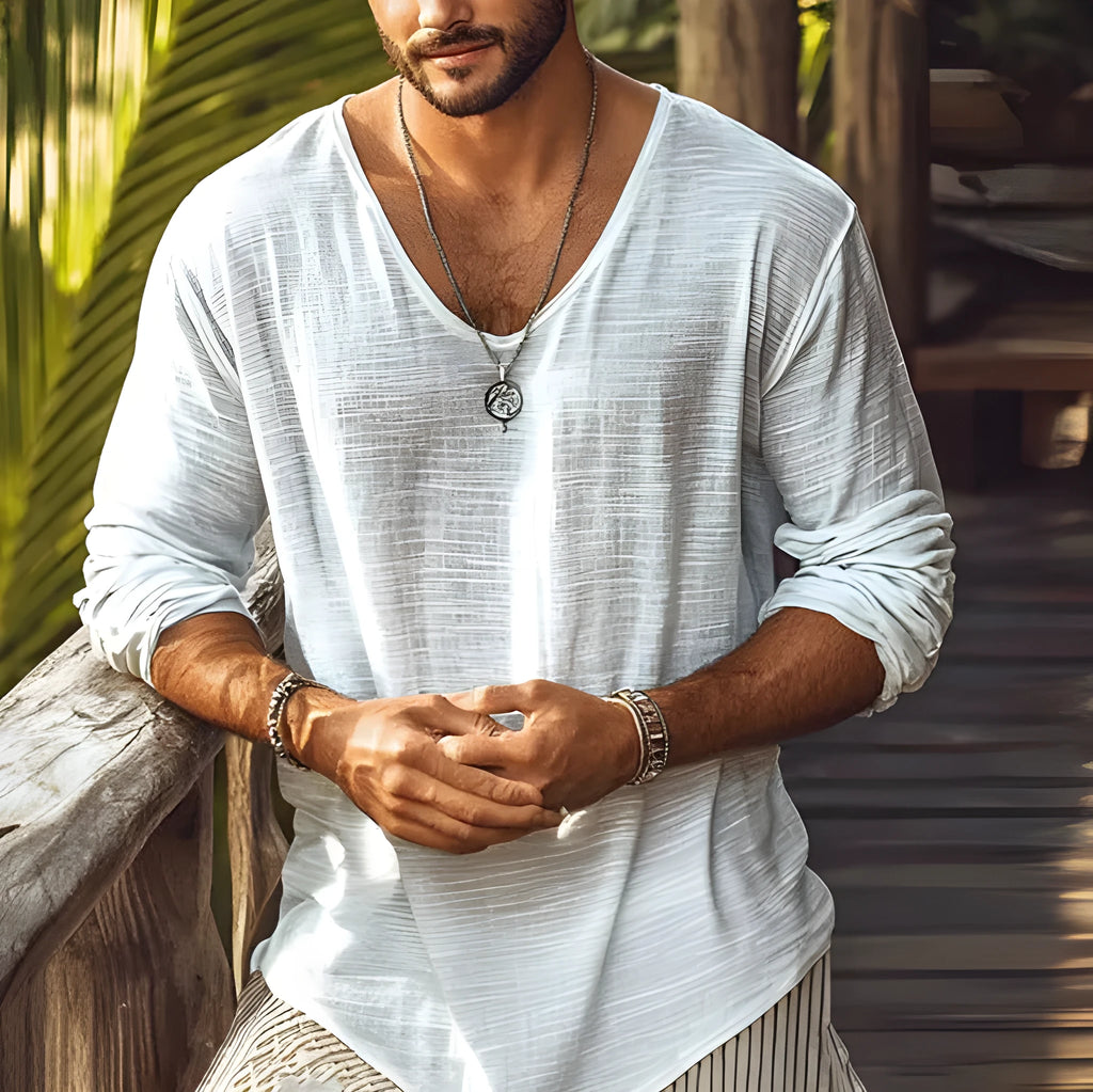 Beige slim-fit long-sleeved V-neck t-shirt laid flat, showing its hemp-blend fabric texture.