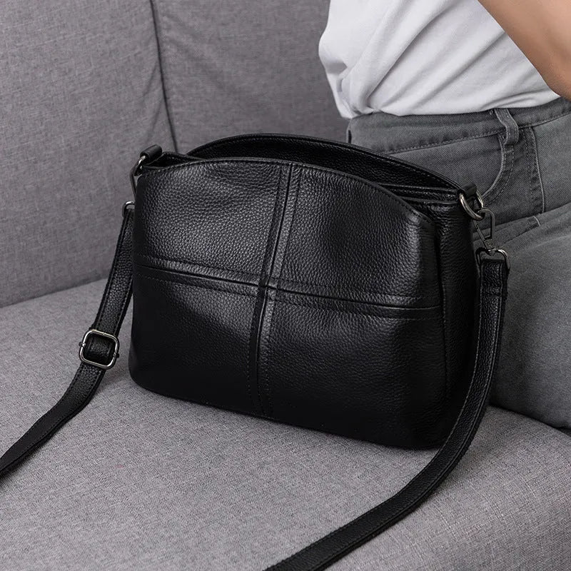 Genuine leather handbag with plaid pattern, single strap, horizontal square shape, medium soft.