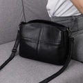 Genuine leather handbag with plaid pattern, single strap, horizontal square shape, medium soft.