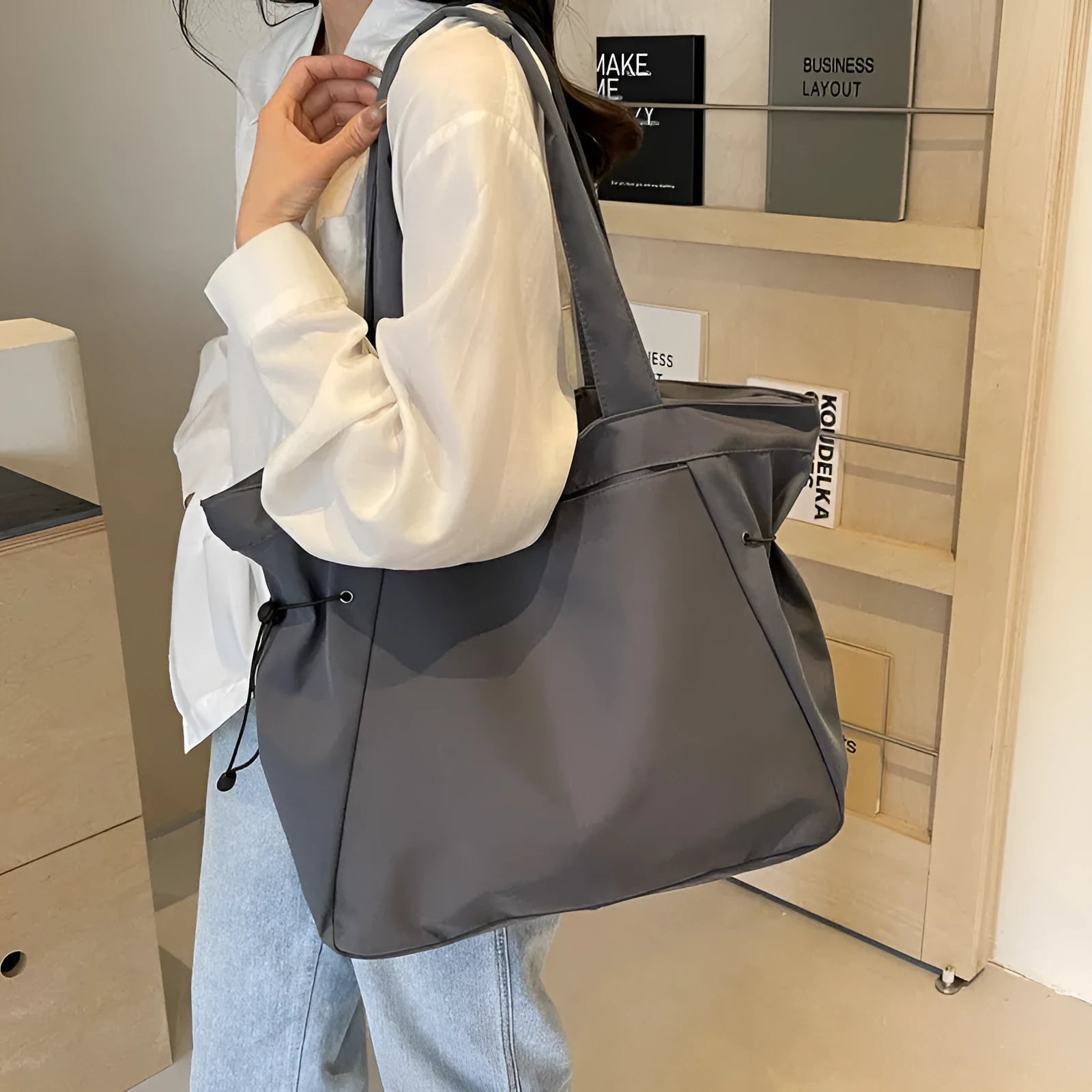 Soft foldable Oxford cloth women's shoulder tote bag shown in available colours: black, brown, dark grey, light grey, purple.