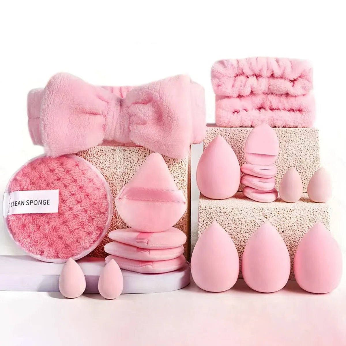 Beauty tool combination set with hydrophilic non-latex material in brown, pink, and purple colours