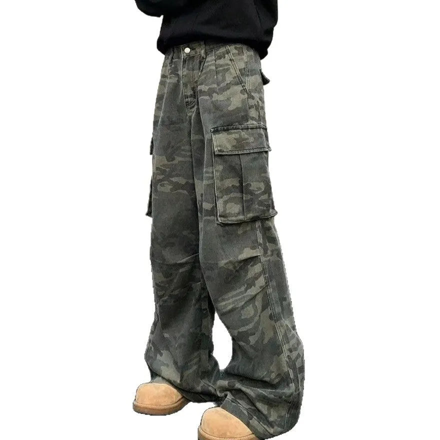 Washed camouflage cargo trousers with multiple pockets on a mid-waist fit.