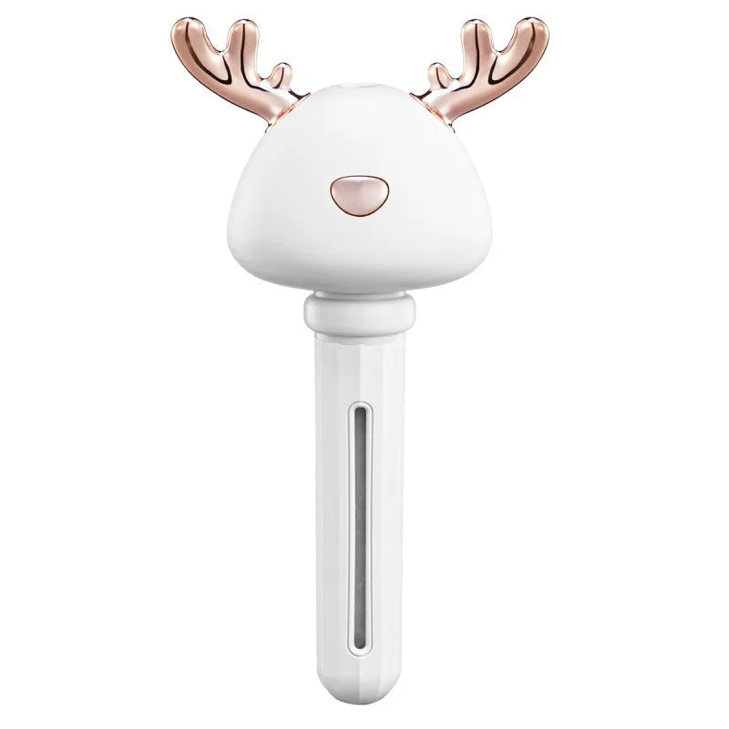 Mini USB portable car humidifier with creative little antler design in beige, showing water tank filler and USB cable