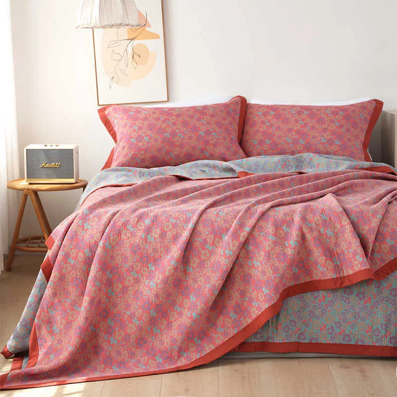 Cotton gauze bed blanket three-piece set with floral patterns showing blanket and two pillowcases