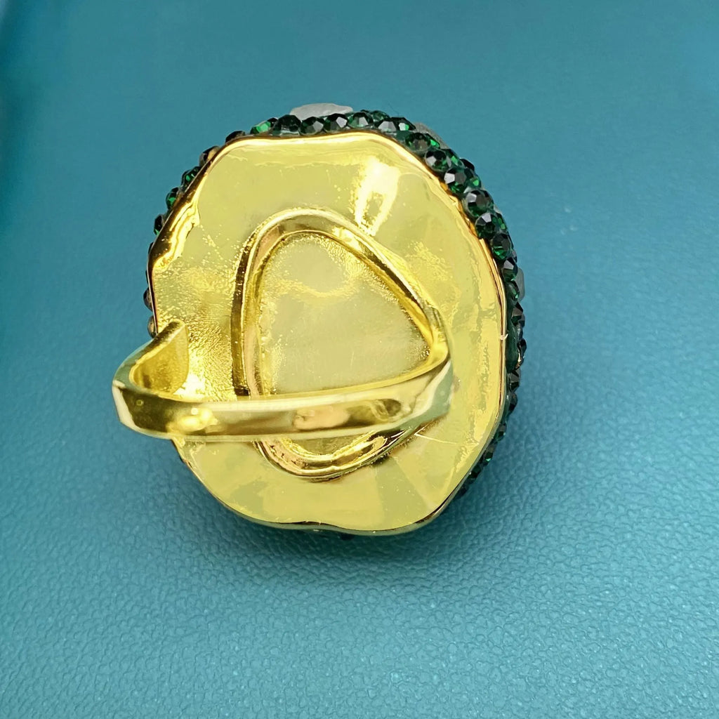 Dark green crystal bud open ring for women with copper band, geometric shape, electroplated finish, and diamond inlay.