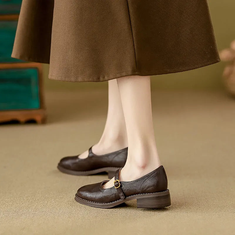 Thick-soled black low top extra height leather shoes for women with mid heel and round toe