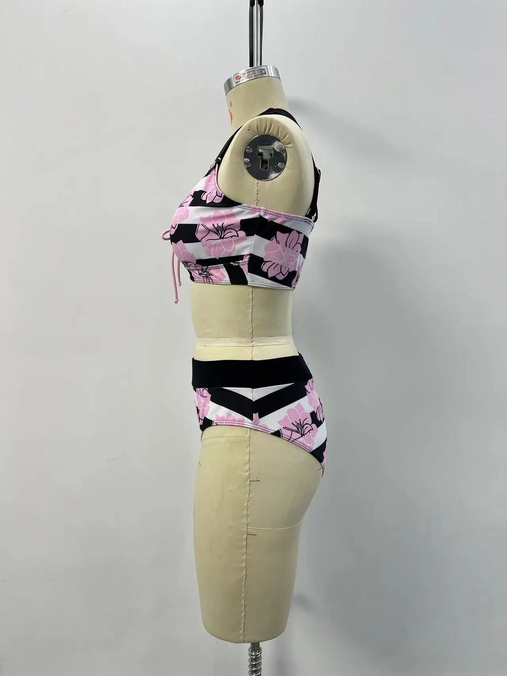 Black printed women's bikini swimsuit with belly covered slimming design.