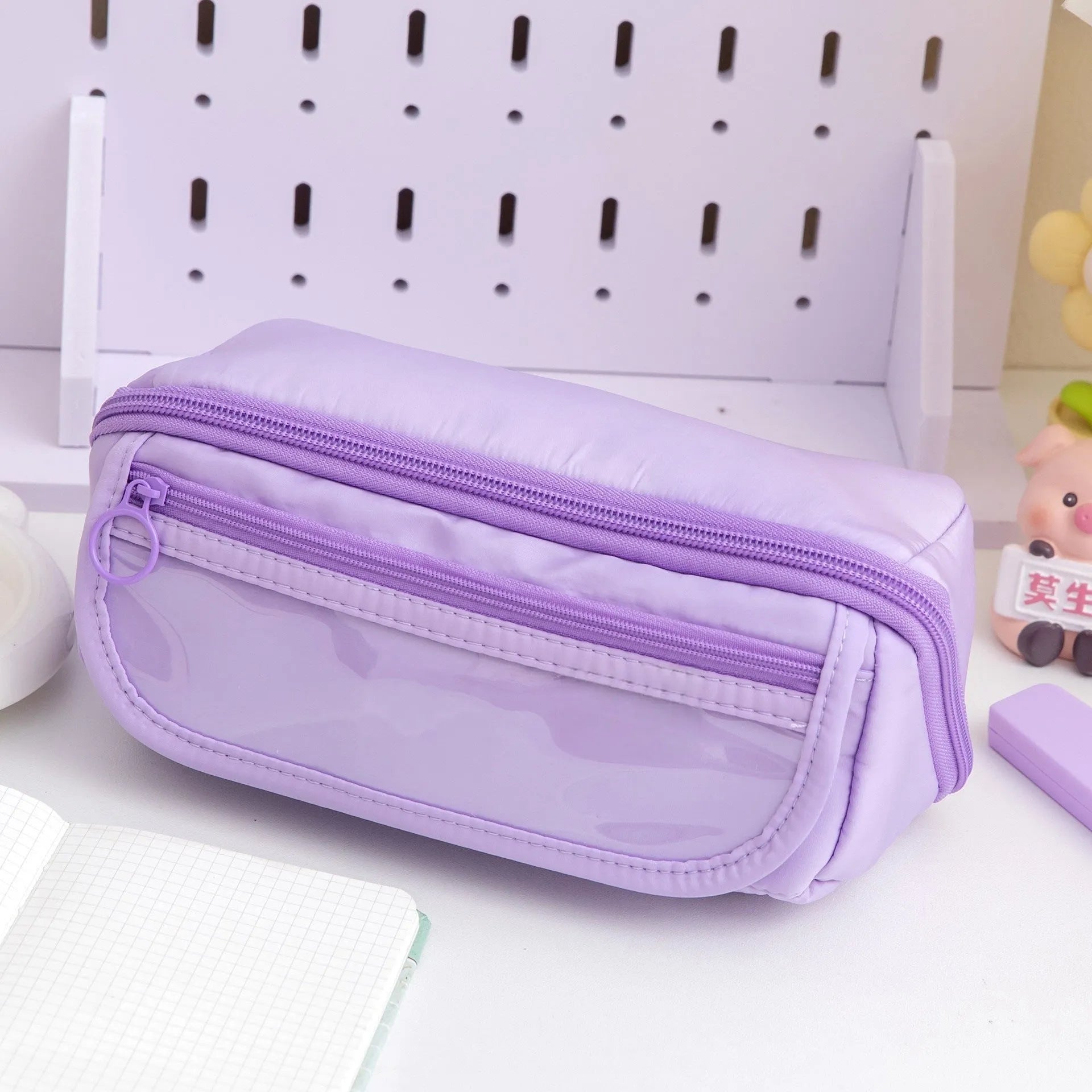 Korean style canvas pencil case with ten-layer flip design open to show multiple pen compartments.