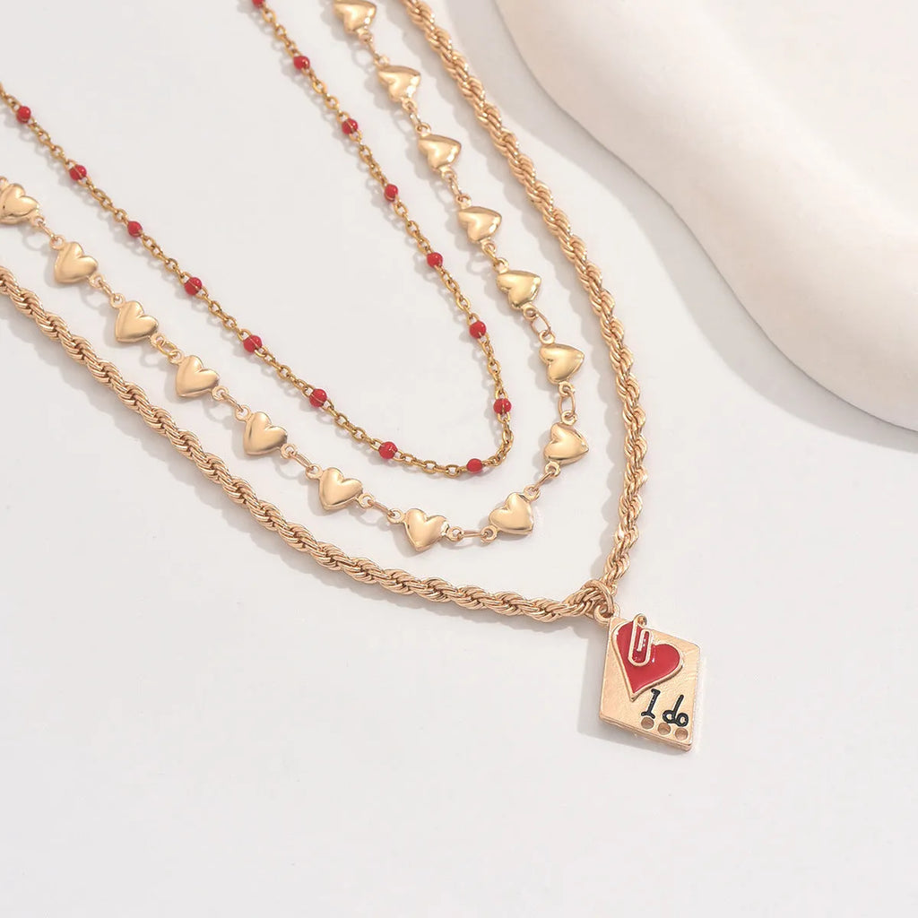 Adjustable three-layer clavicle chain necklace with geometric heart pendant in zinc alloy