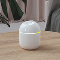 USB water drop humidifier in white, pink, or green with colour light, mute operation, and 2-8 hour timer