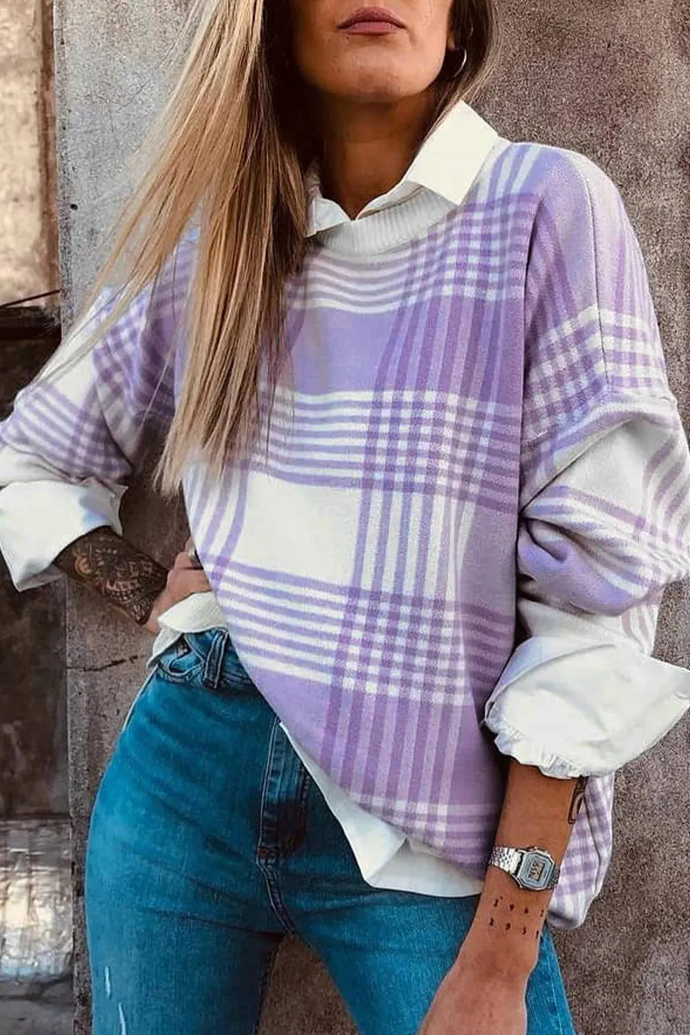Lilac plaid print women's loose sweater with ribbed trim on long sleeves.