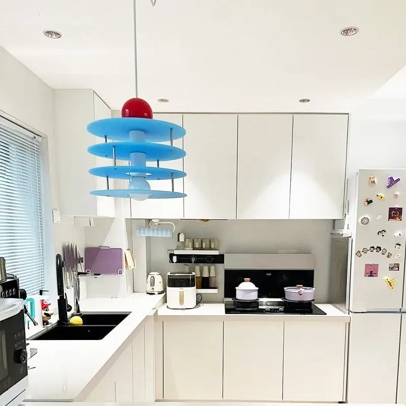 Ph5 macaron design restaurant chandelier with frosted coloured glass shades.
