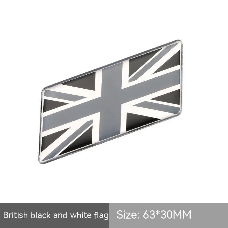 Aluminium national flag car sticker in a parallelogram shape measuring 6.3 by 3 centimetres.