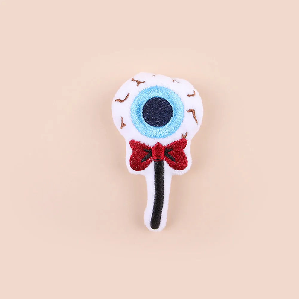 Small handheld cat teaser wand with plush candy design toy head for interactive play
