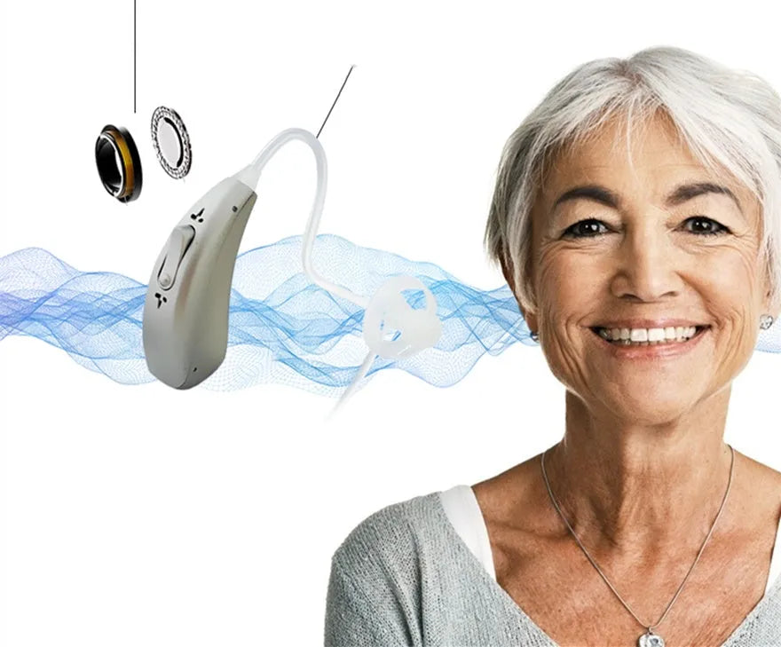 Wireless invisible hearing aid with USB charging case showing blue and green indicator lights