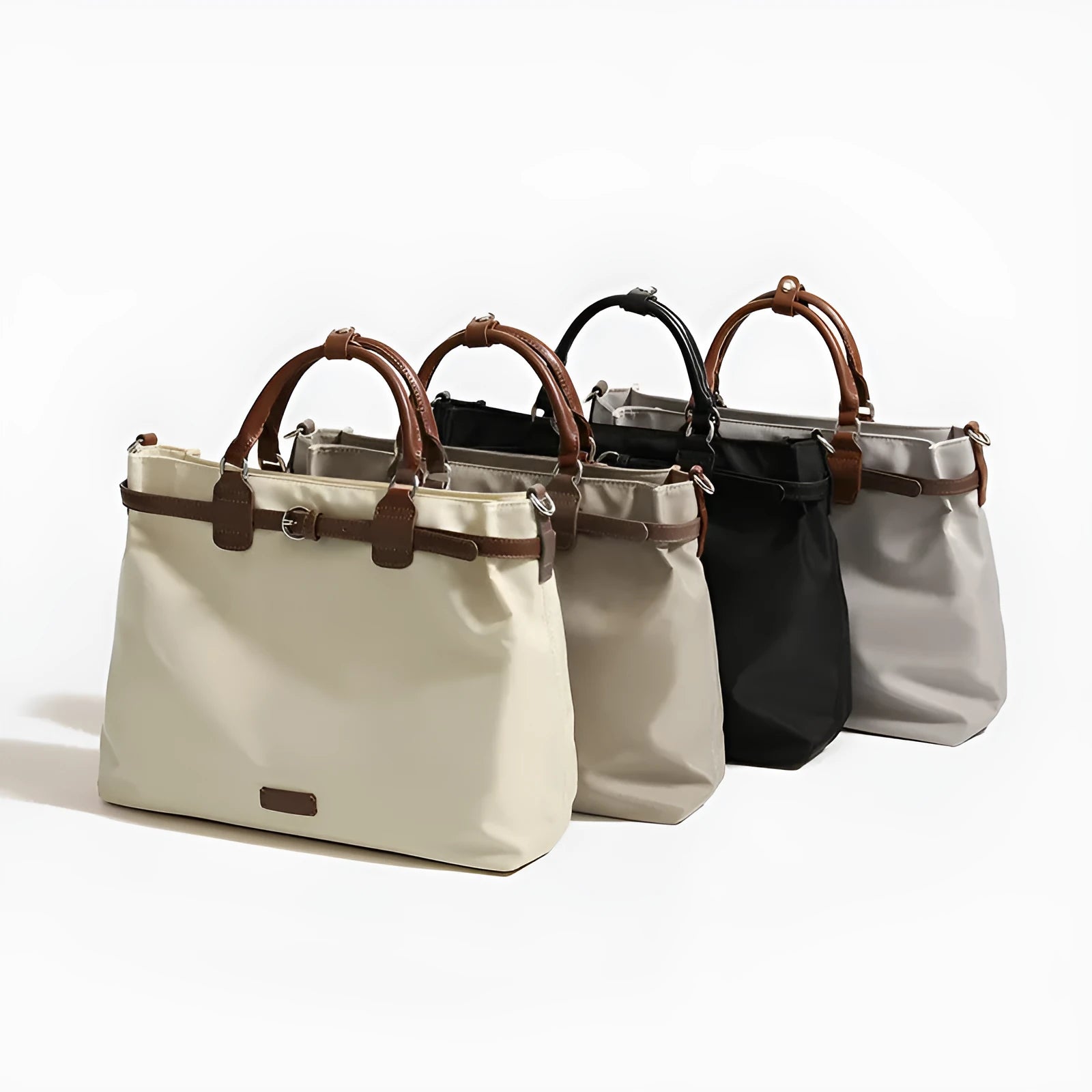 Women's nylon shoulder tote bag in a horizontal square shape showing internal organiser pockets.