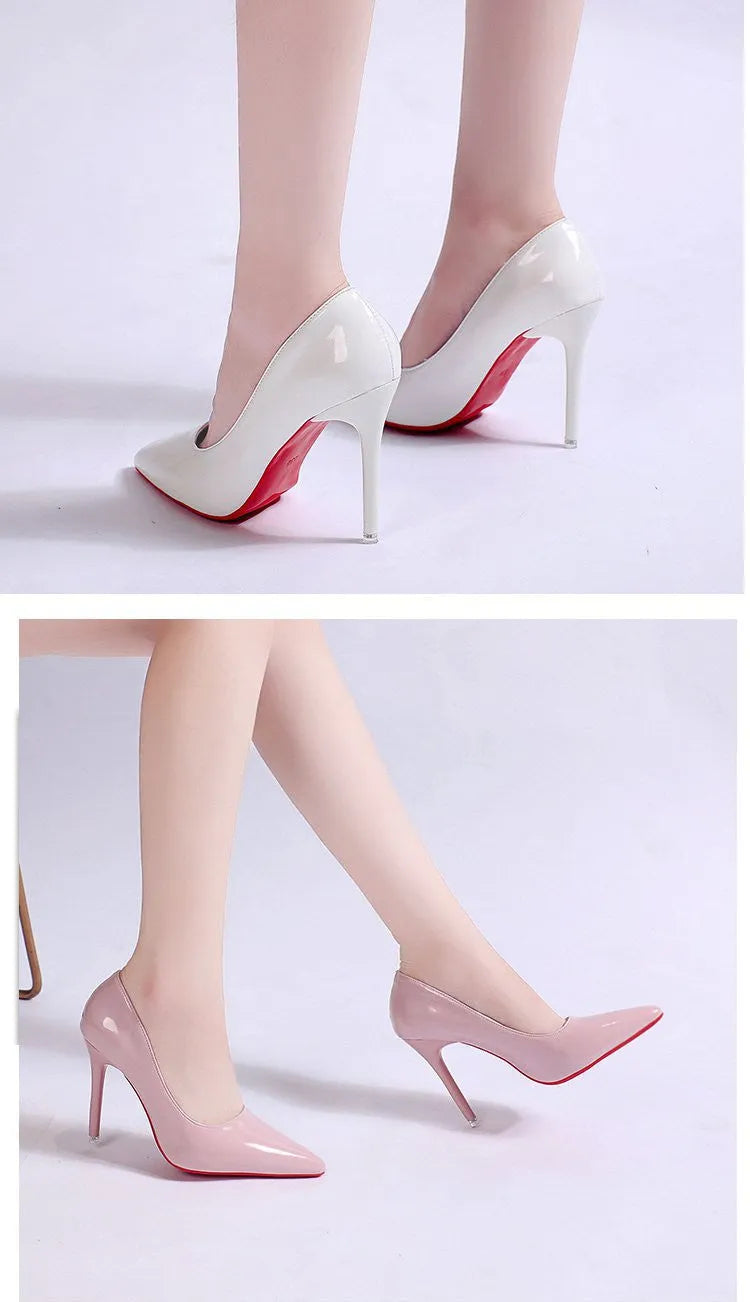 Women's black pointed toe stiletto pump with a shallow mouth on a rubber sole.
