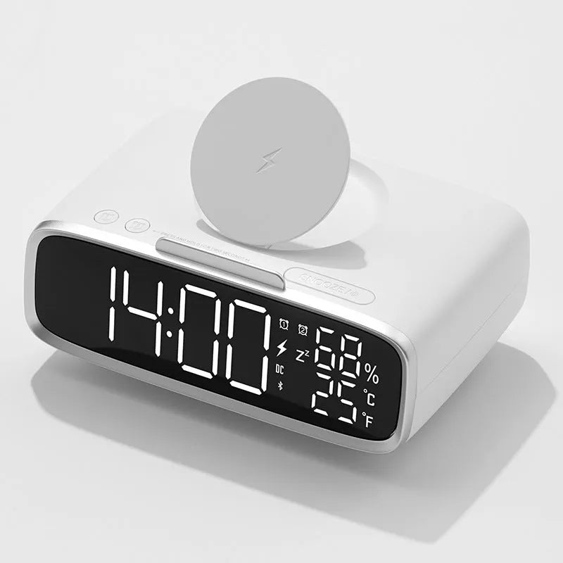 White wireless charging Bluetooth speaker with night light and alarm clock display on desk