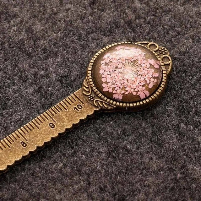 Handmade dried flower ruler bookmark with gypsophila, daffodil, lace flower, and clover on 12cm base in multiple colours.