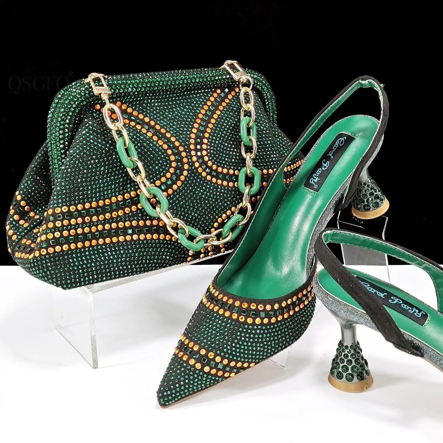 Women's pointed toe high heel shoe and matching small bag set with rhinestone detail on a wine glass heel.