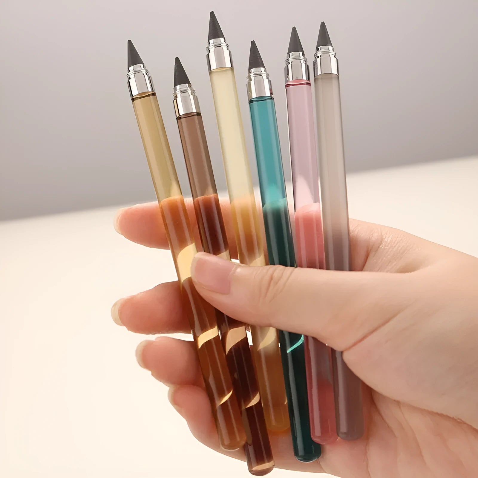 Transparent acrylic eternal pencil with alloy writing tip and plastic housing
