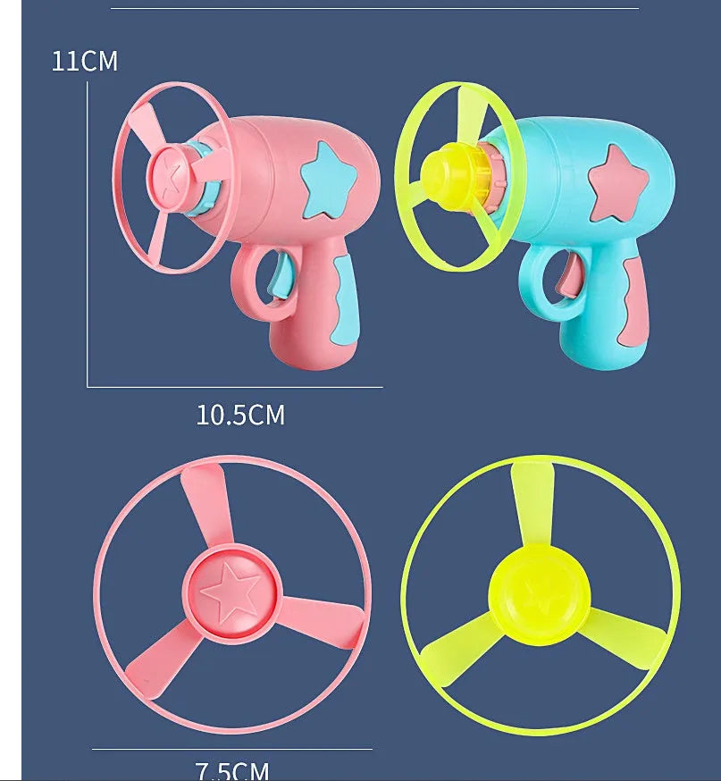 Flying saucer launcher toy set with plastic disc shooter gun, flashing discs, and target board, in blue, navy, pink, and yellow