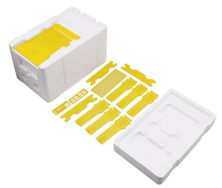 Three white EPS foam bee delivery boxes for beehive frame and queen transport.
