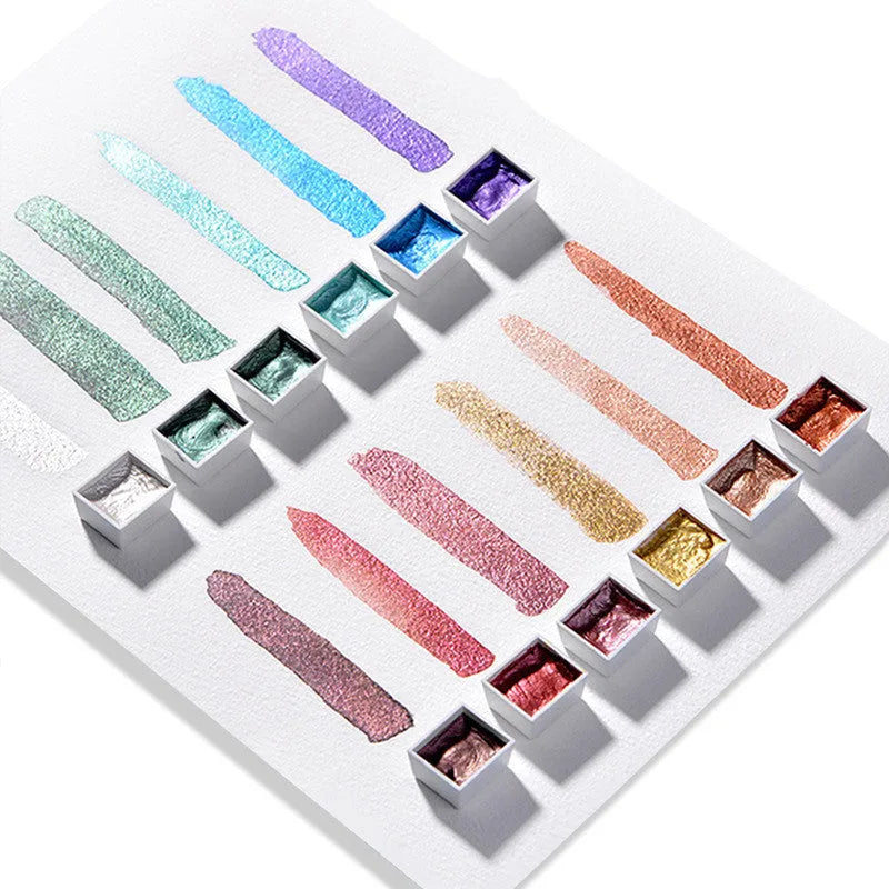 Solid watercolour pigment set showing pearlescent colour blocks in organised box