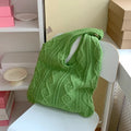 Retro hollow knitted women's tote bag in a solid colour with double shoulder straps.