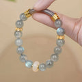 Emerald Green Tian Shan Cui women's bracelet with round beads in a Chinese national style.